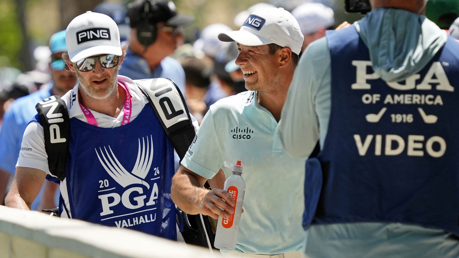 Viktor Hovland with his caddie Shay Knight