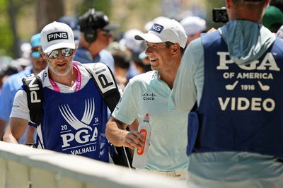 Viktor Hovland with his caddie Shay Knight