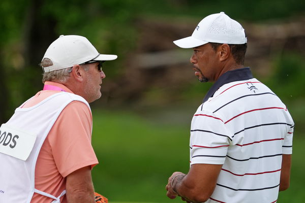 Tiger Woods with his caddie Lance Bennett