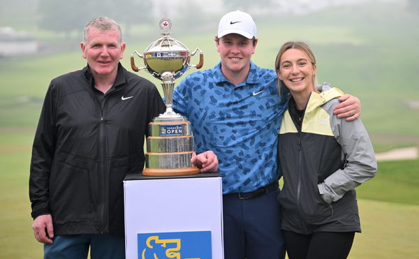 MacIntyre with his father and girlfriend