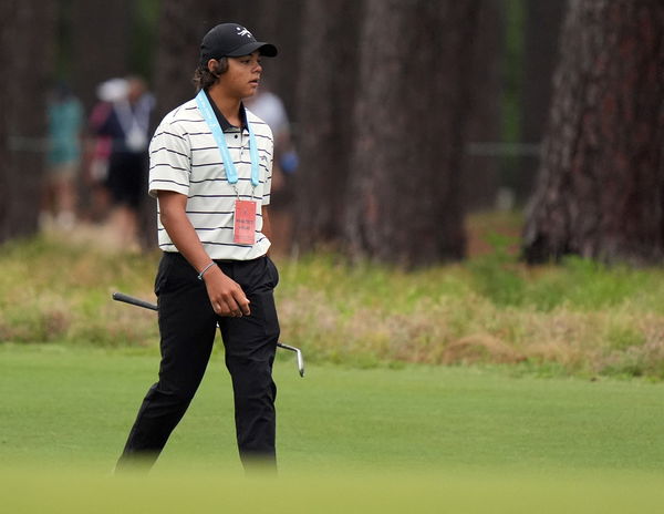 Charlie Woods is helping Tiger Woods at the US Open