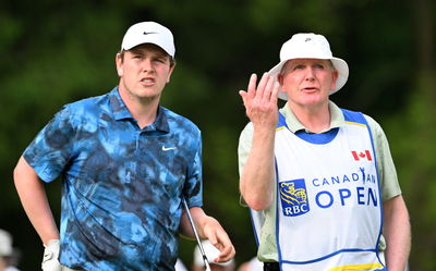 Bob MacIntyre with his caddie and father Dougie