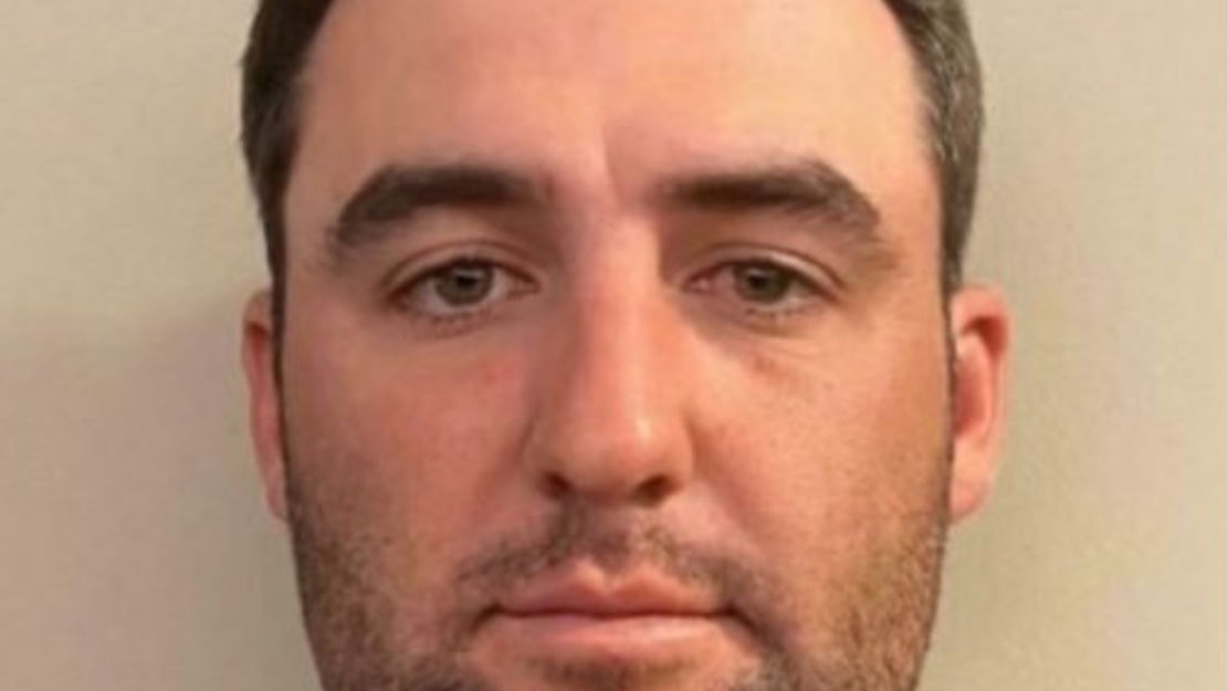 Scottie Scheffler's Olympic Games mugshot