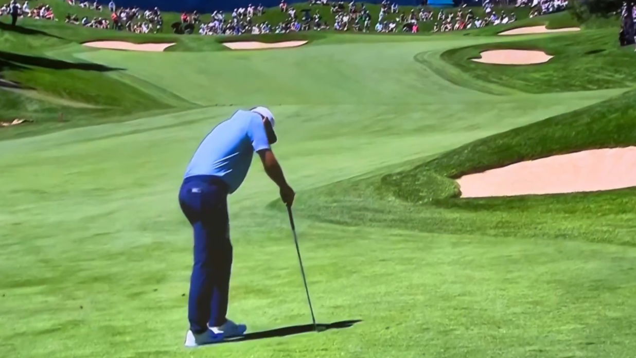 Scottie Scheffler tweaked his back on Thursday