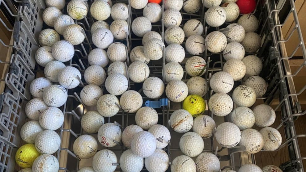 A golfer has stuck his balls in the dishwasher