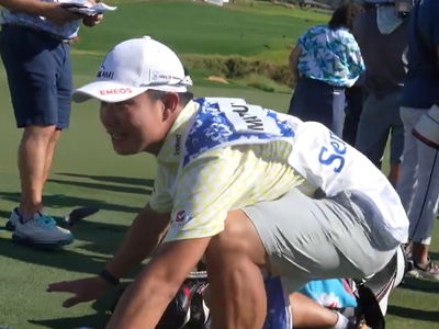 Hideki Matsuyama's caddie Shota Hayafuji