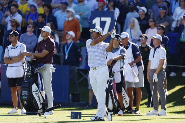 Hideki Matsuyama and caddie Shota Hayafuji at The Players Championship.