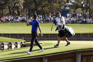 Min Woo Lee and his caddie