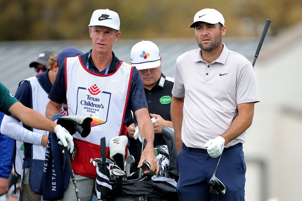 Ted Scott caddies for Scottie Scheffler