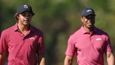 Charlie Woods with dad Tiger Woods