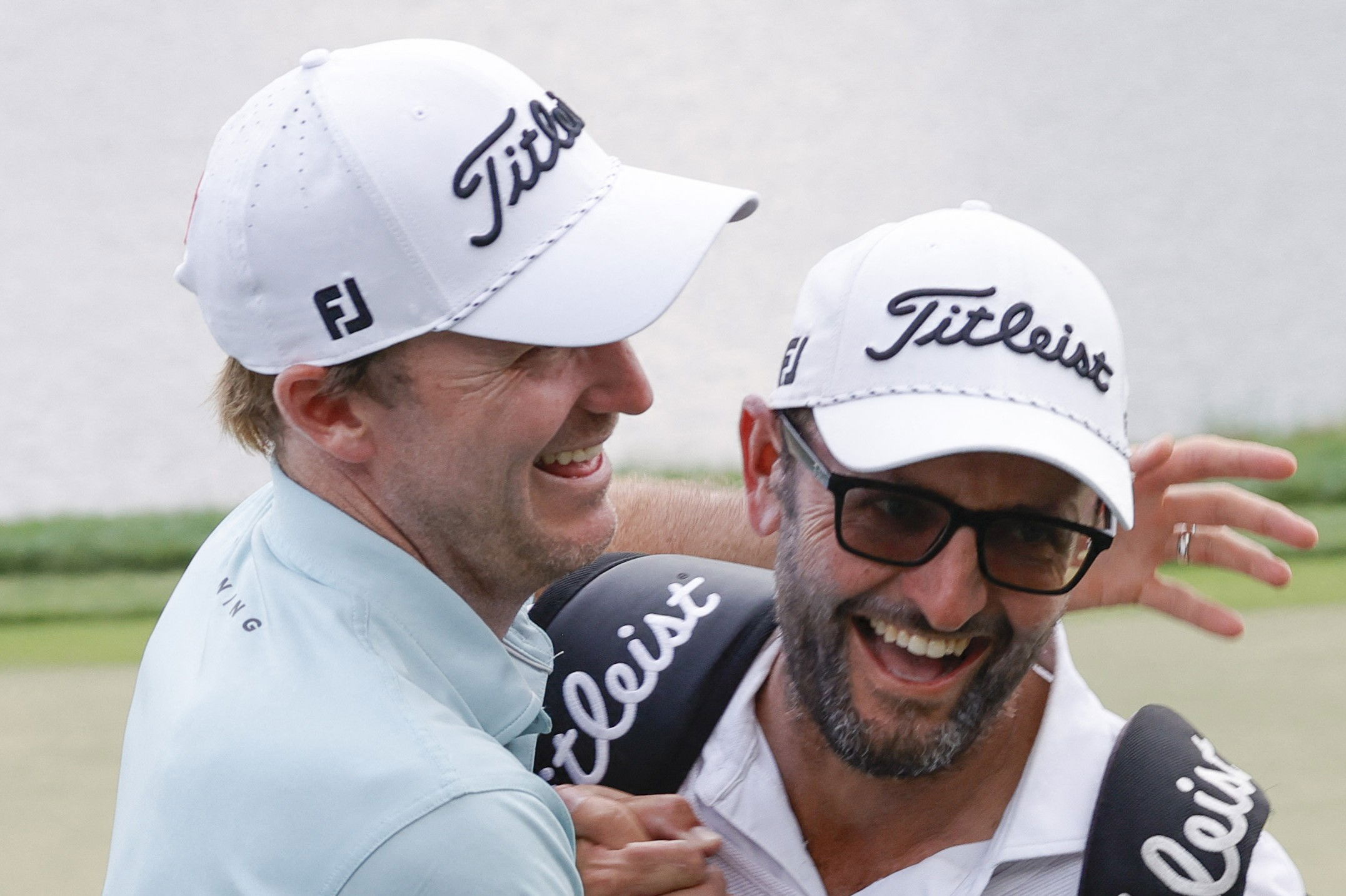 Russell Henley and his caddie