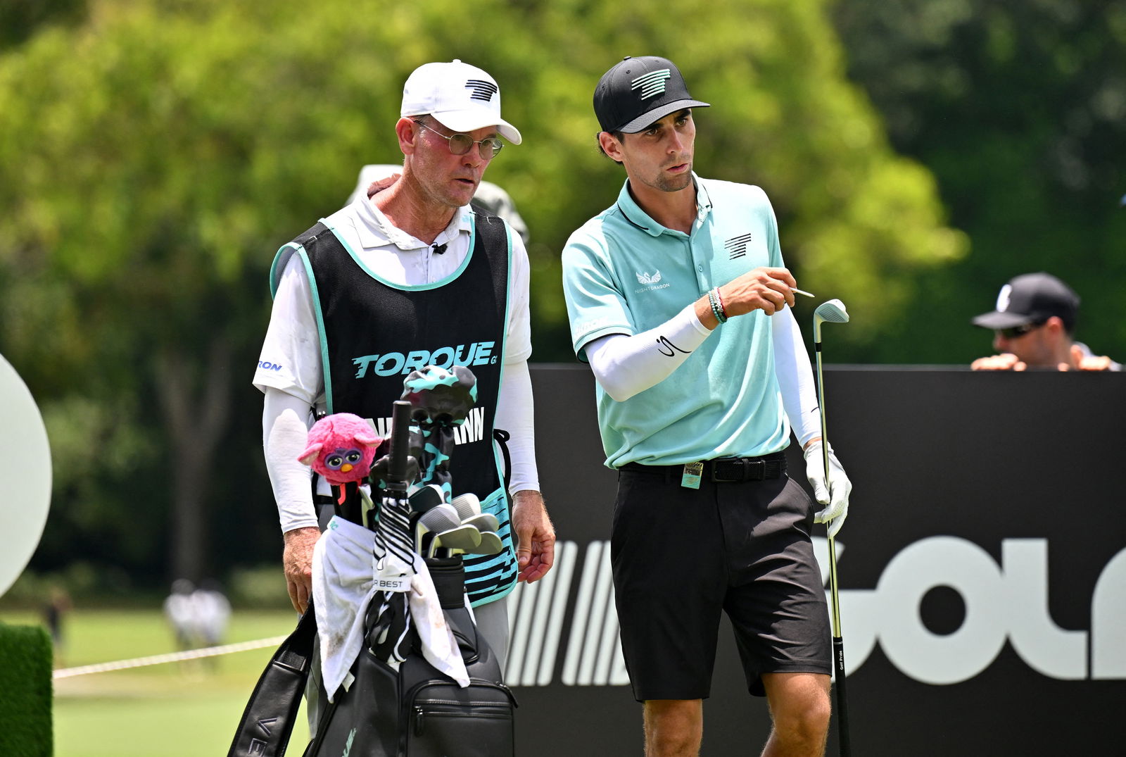 Joaquin Niemann and caddie Gary Matthews