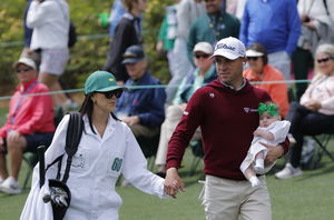 Justin Thomas and his wife