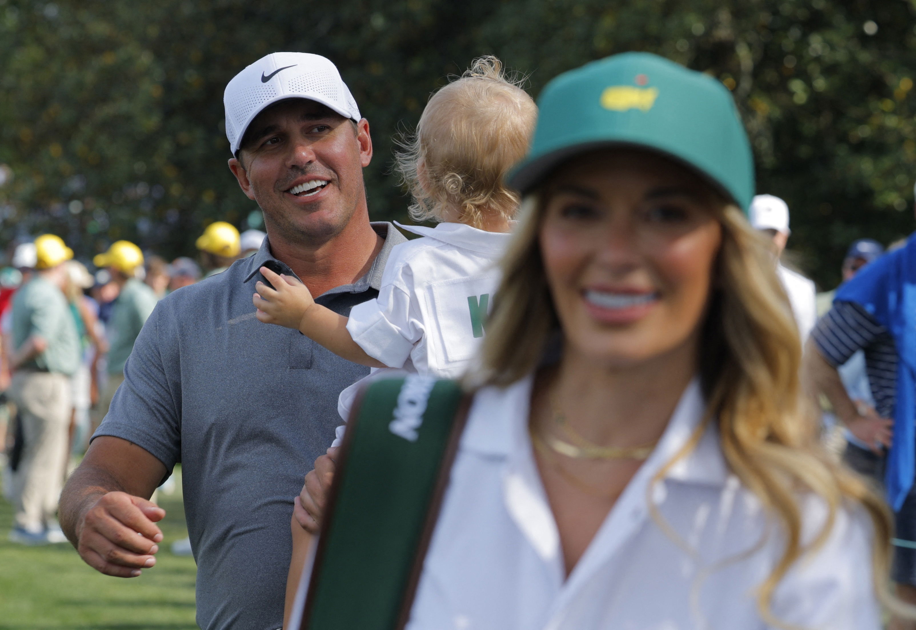 Brooks with wife Jena and son Crew