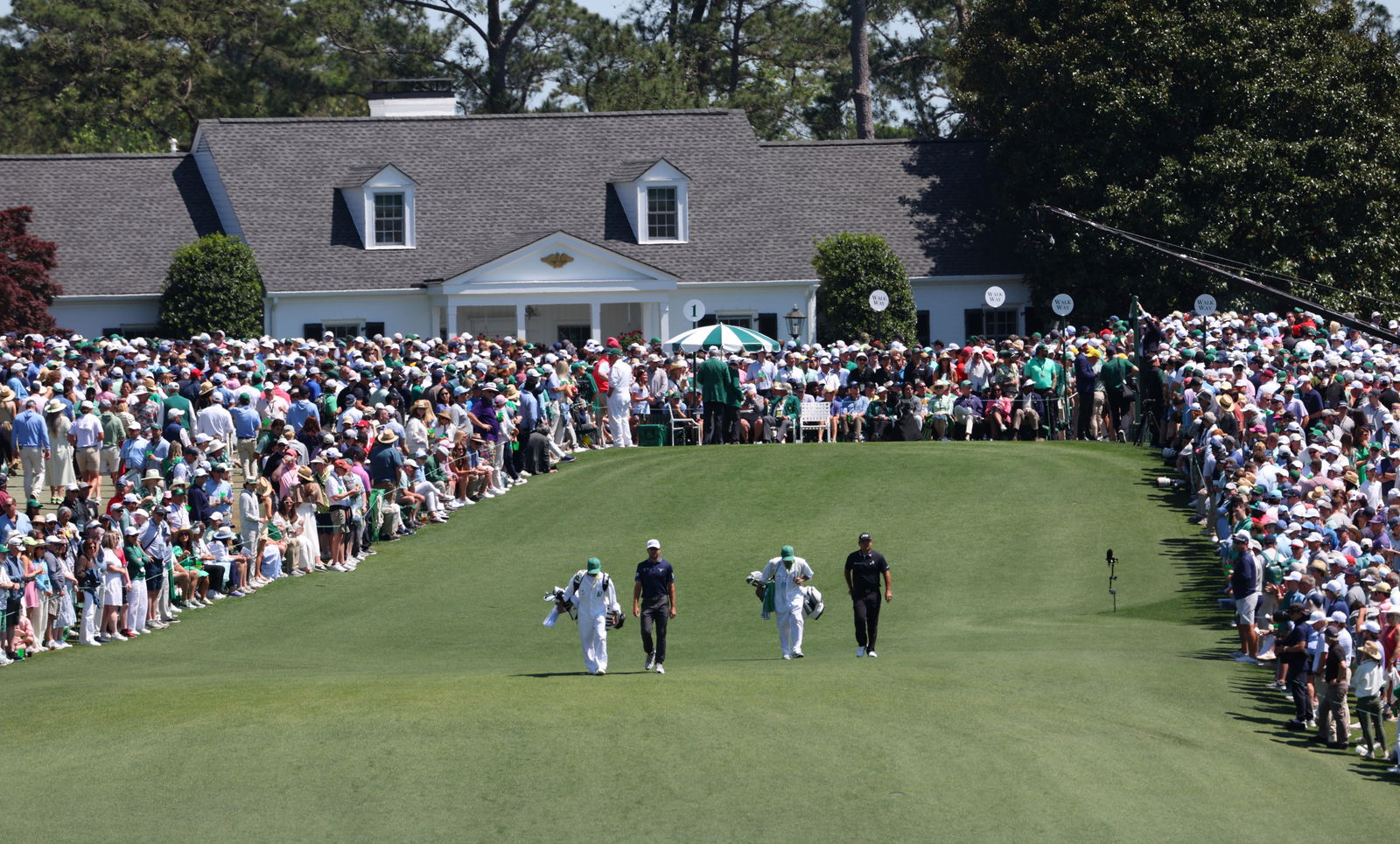 Patrick Reed and Corey Conners at the 2025 Masters