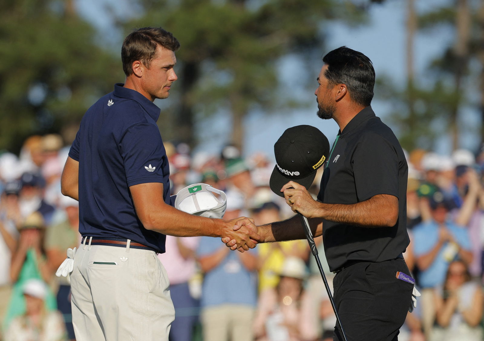 Day shakes hands on 18 with Aberg