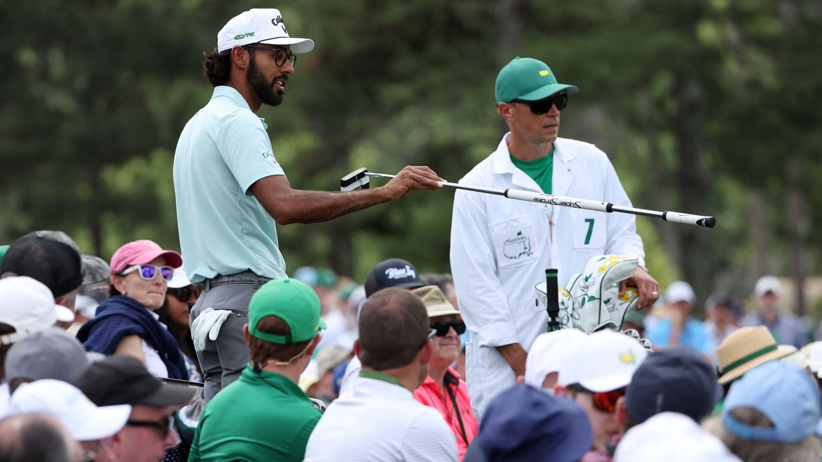 Akshay Bhatia and caddie John Limanti