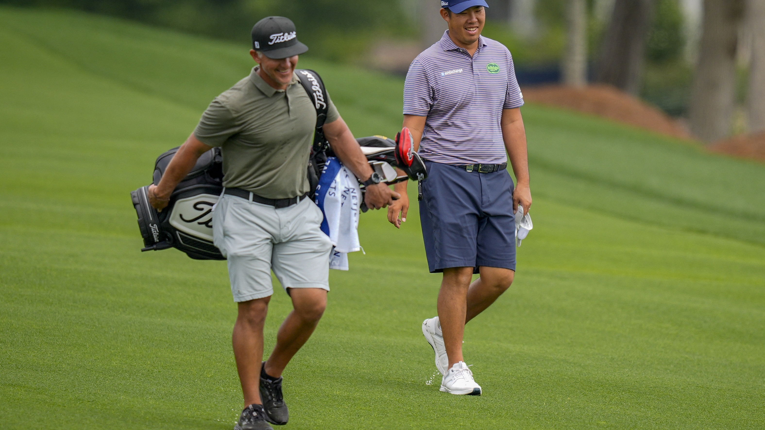 Byeong Hun An and his caddie