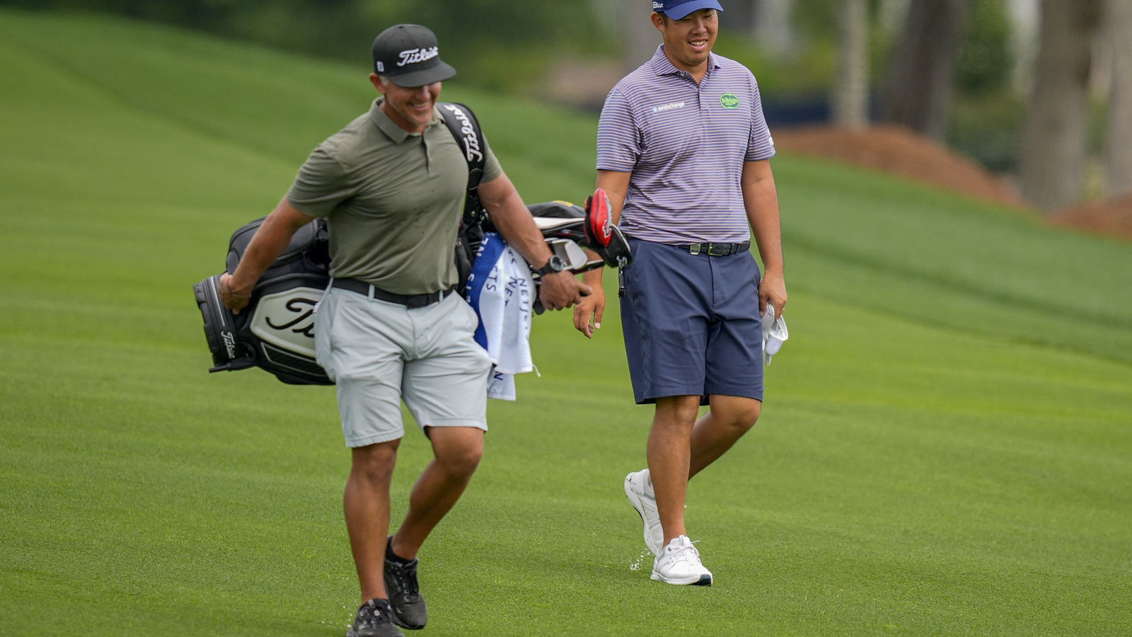 Byeong Hun An and his caddie