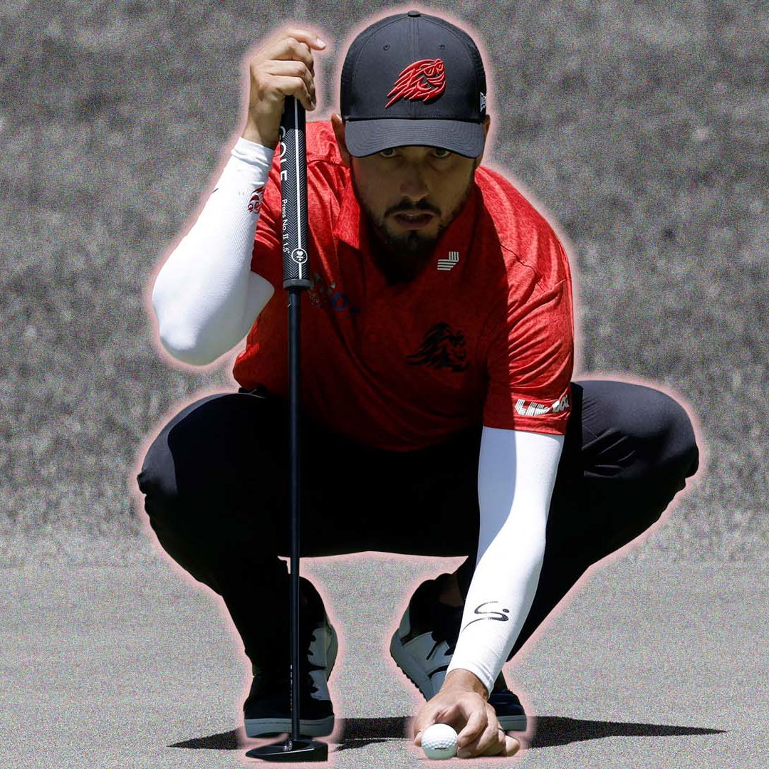 Abraham Ancer lines up a long putt at LIV Golf Andalucia