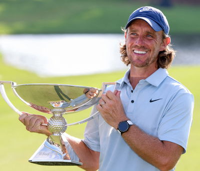 Tommy Fleetwood with the FedExCup trophy