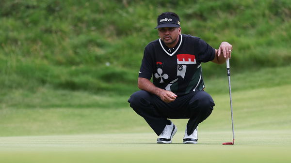 Day lines up a putt at The Open in his signature Payntr Eighty-Seven shoes
