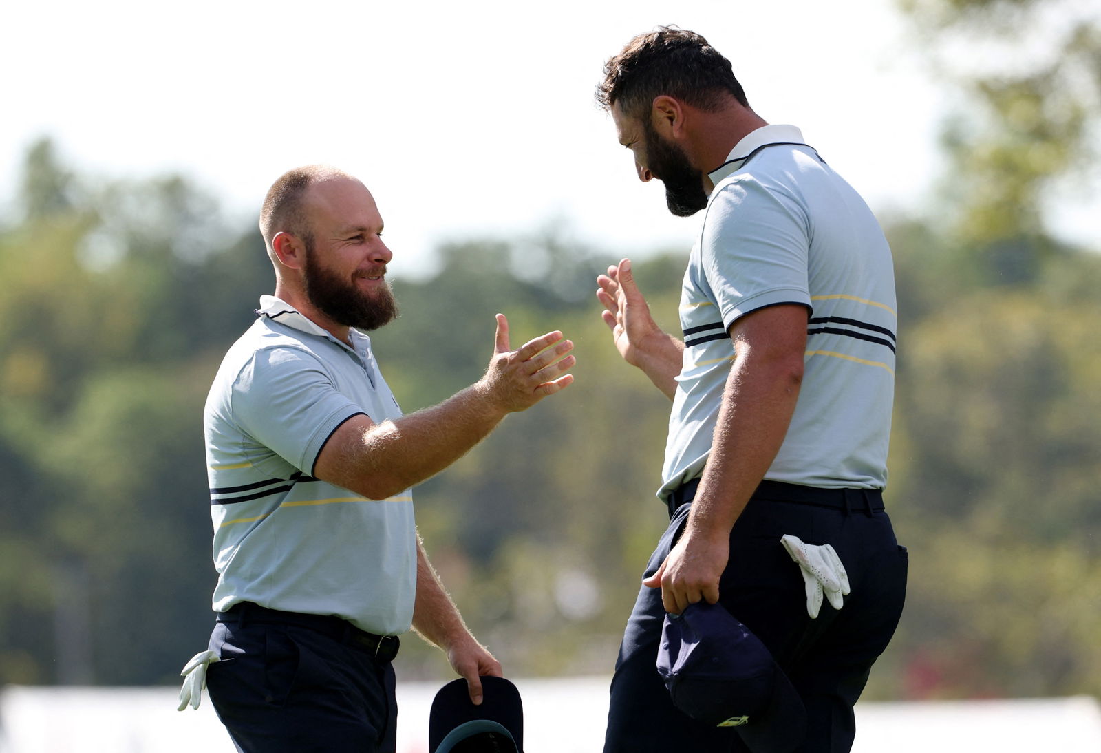 Hatton celebrates with Rahm at Ryder Cup