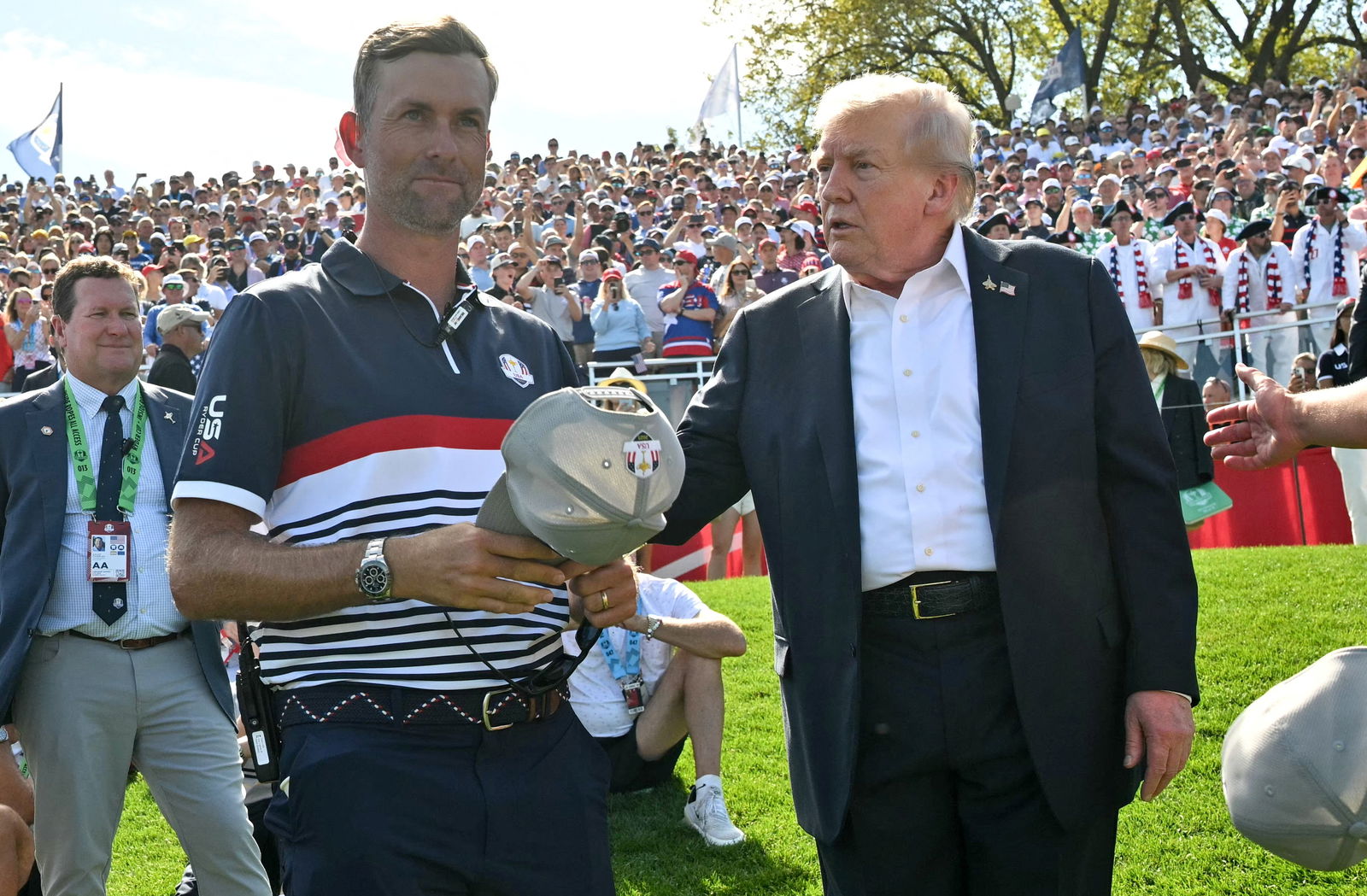 Webb Simpson alongside Donald Trump