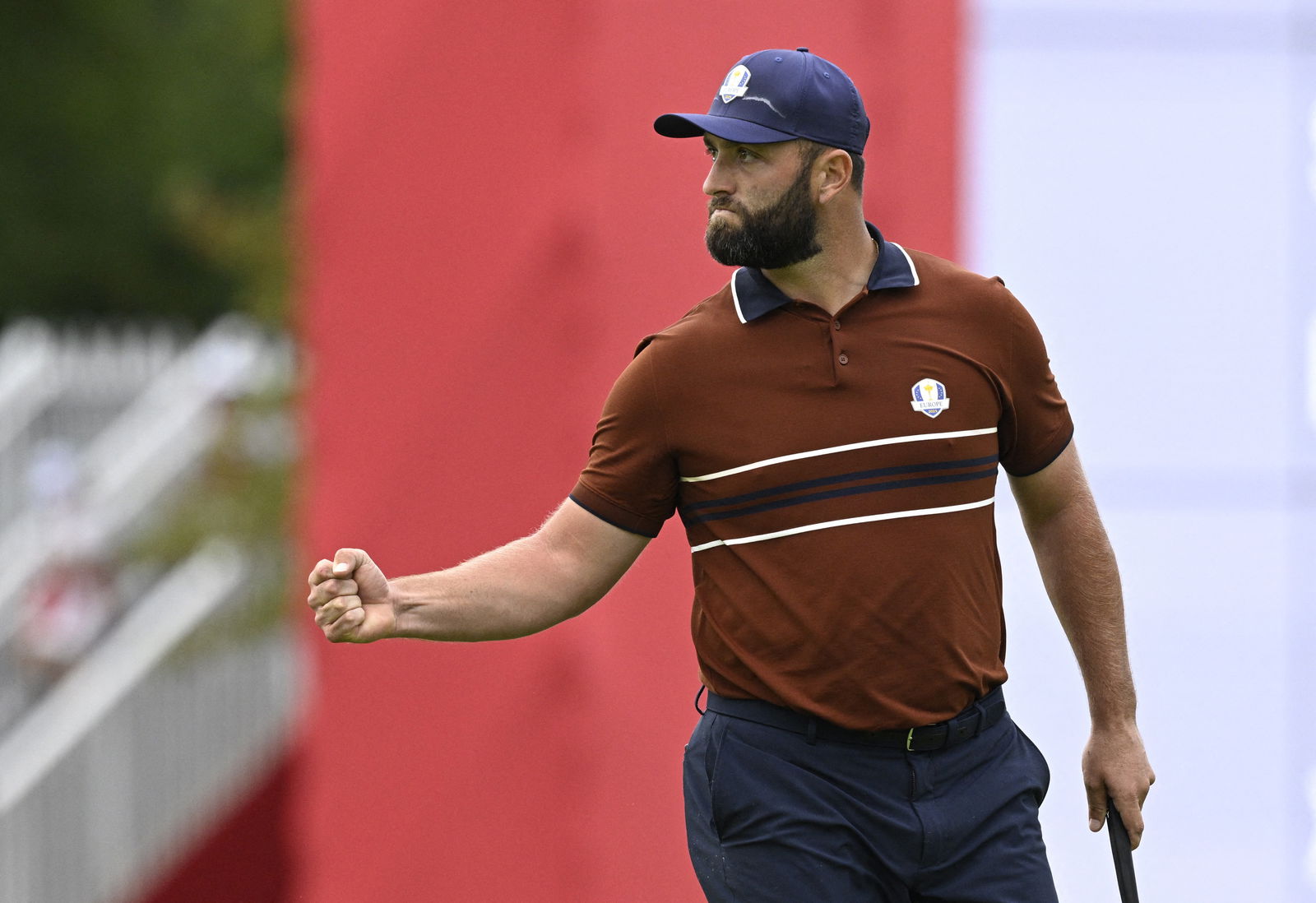 Rahm celebrates a birdie putt at the Ryder Cup