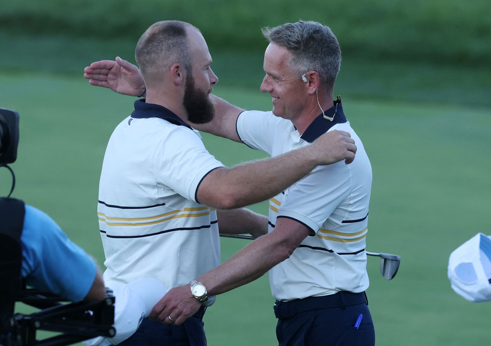 Hatton and Donald embrace at Bethpage
