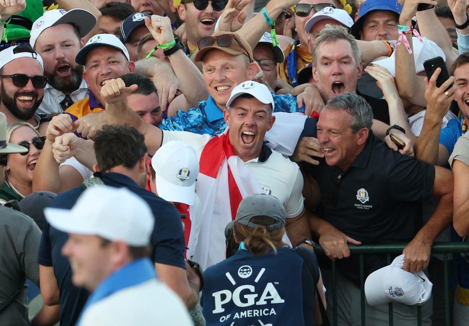 McIroy celebrates with fans at Bethpage