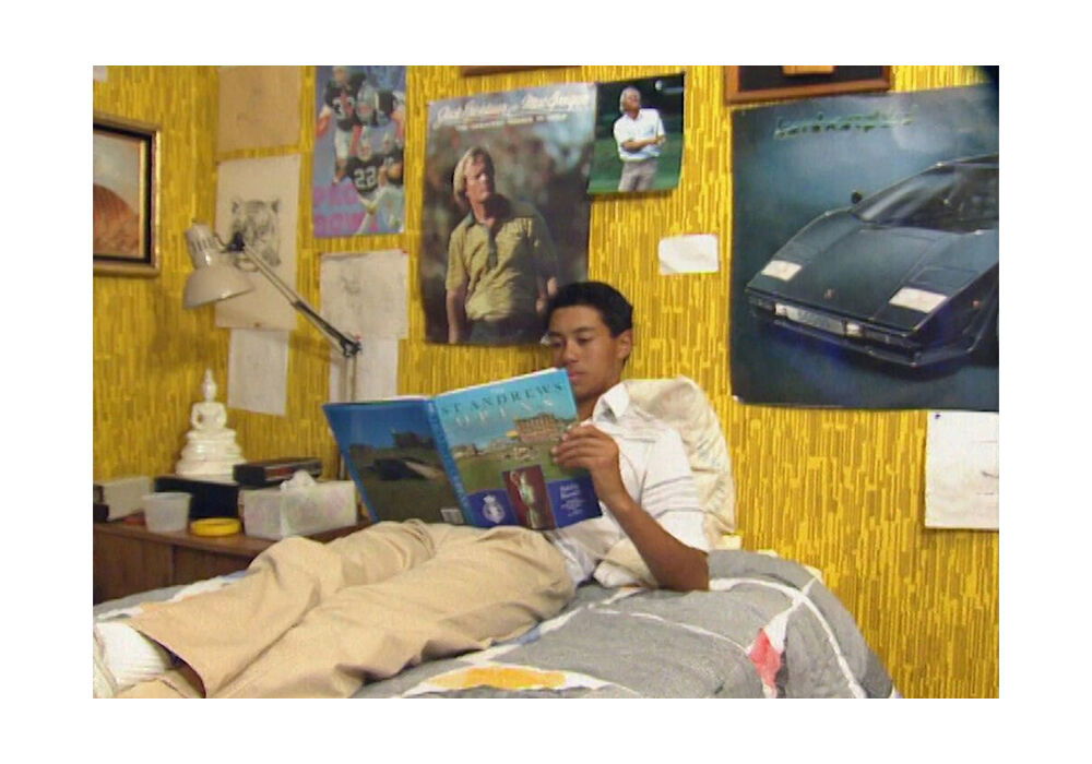 Tiger Woods reading about St Andrews [Sun Day Red]