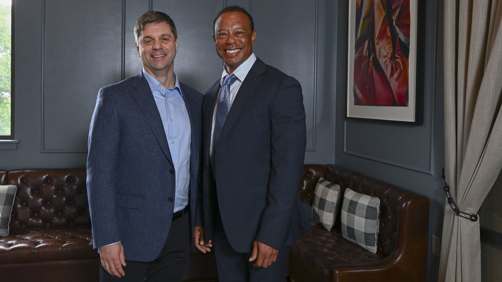 Brian Rolapp and Tiger Woods