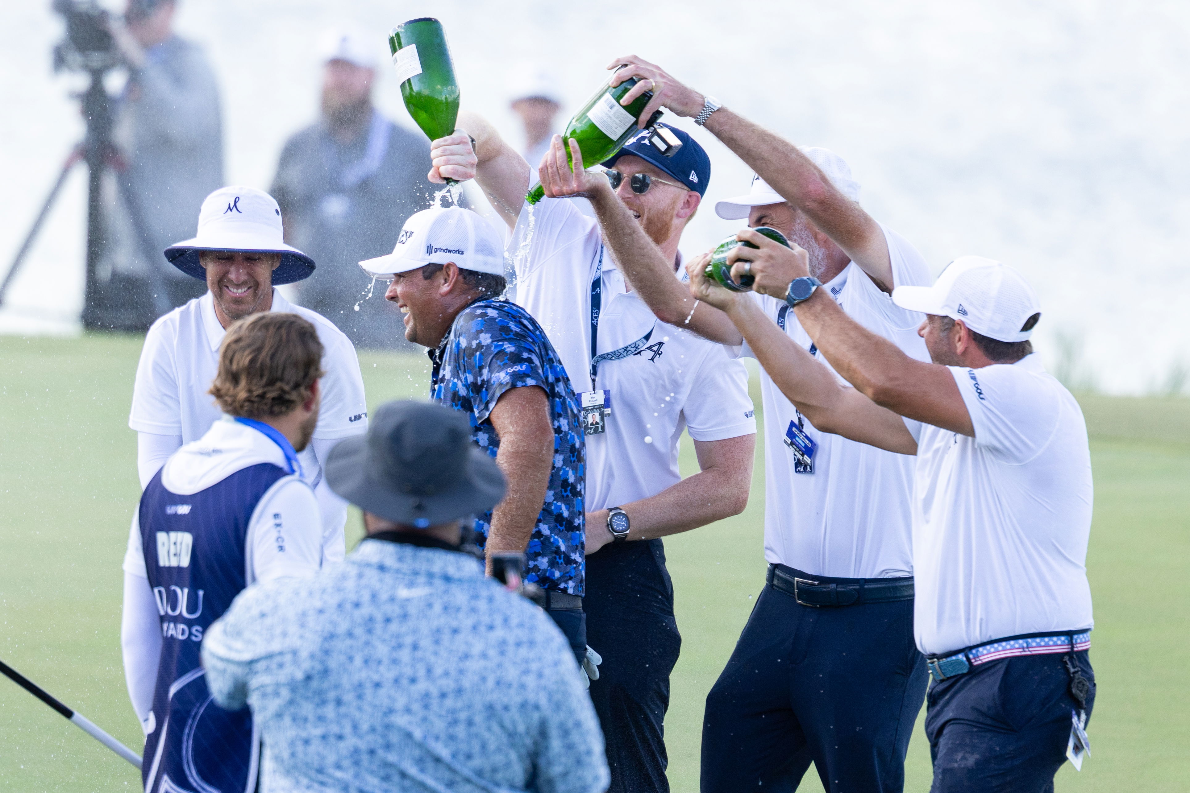 LIV Golf's Patrick Reed is doused in champagne