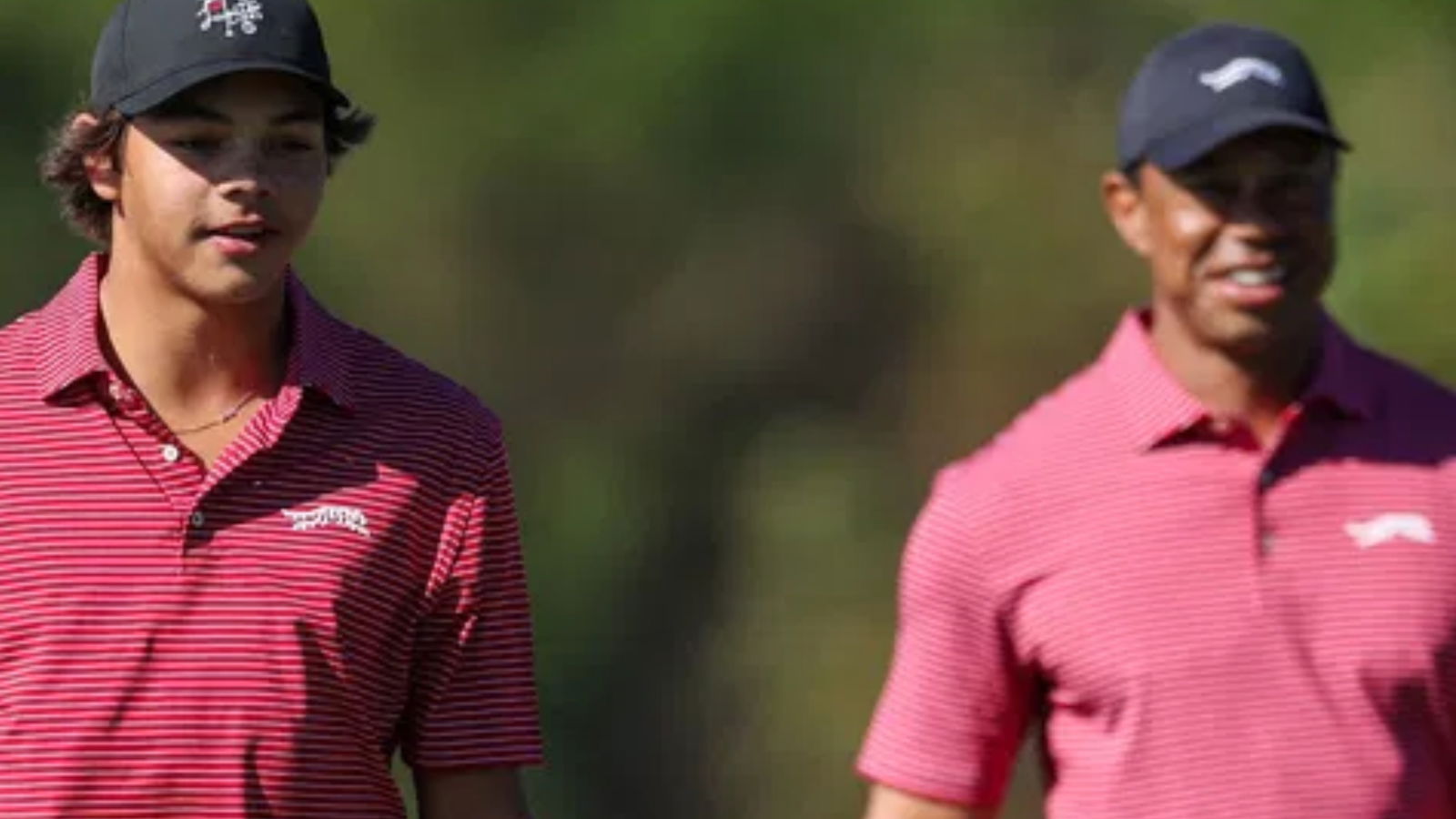 Charlie Woods with father Tiger Woods