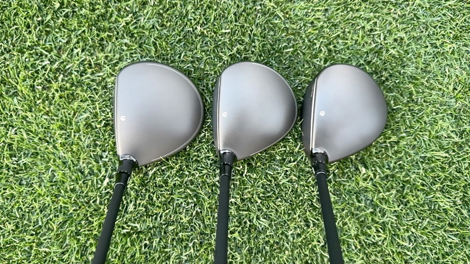 All three Qi4D fairway woods at address