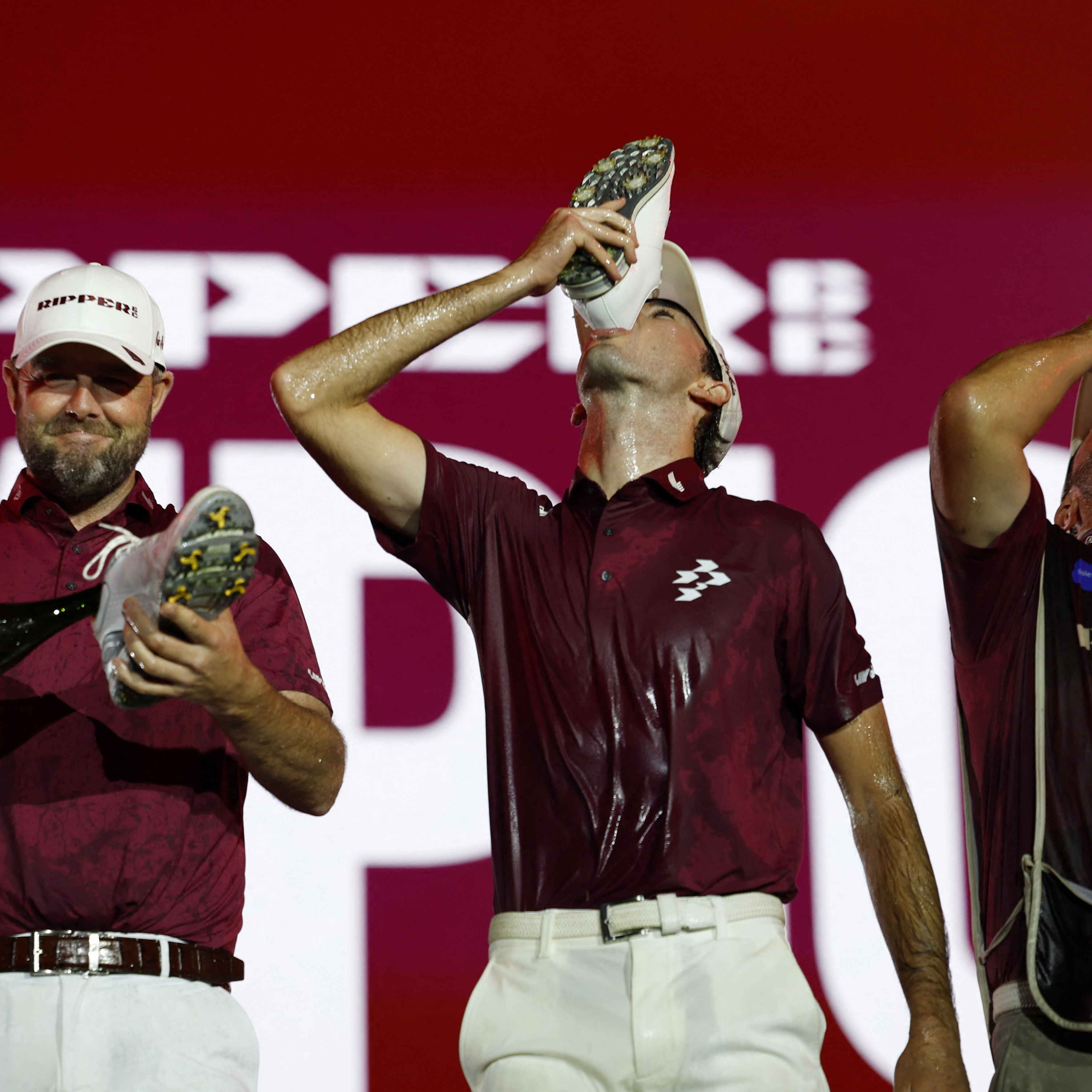 Elvis Smylie does a shoey on stage with Ripper GC
