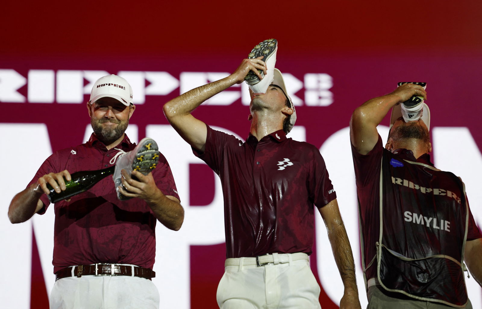Elvis Smylie does a shoey on stage with Ripper GC