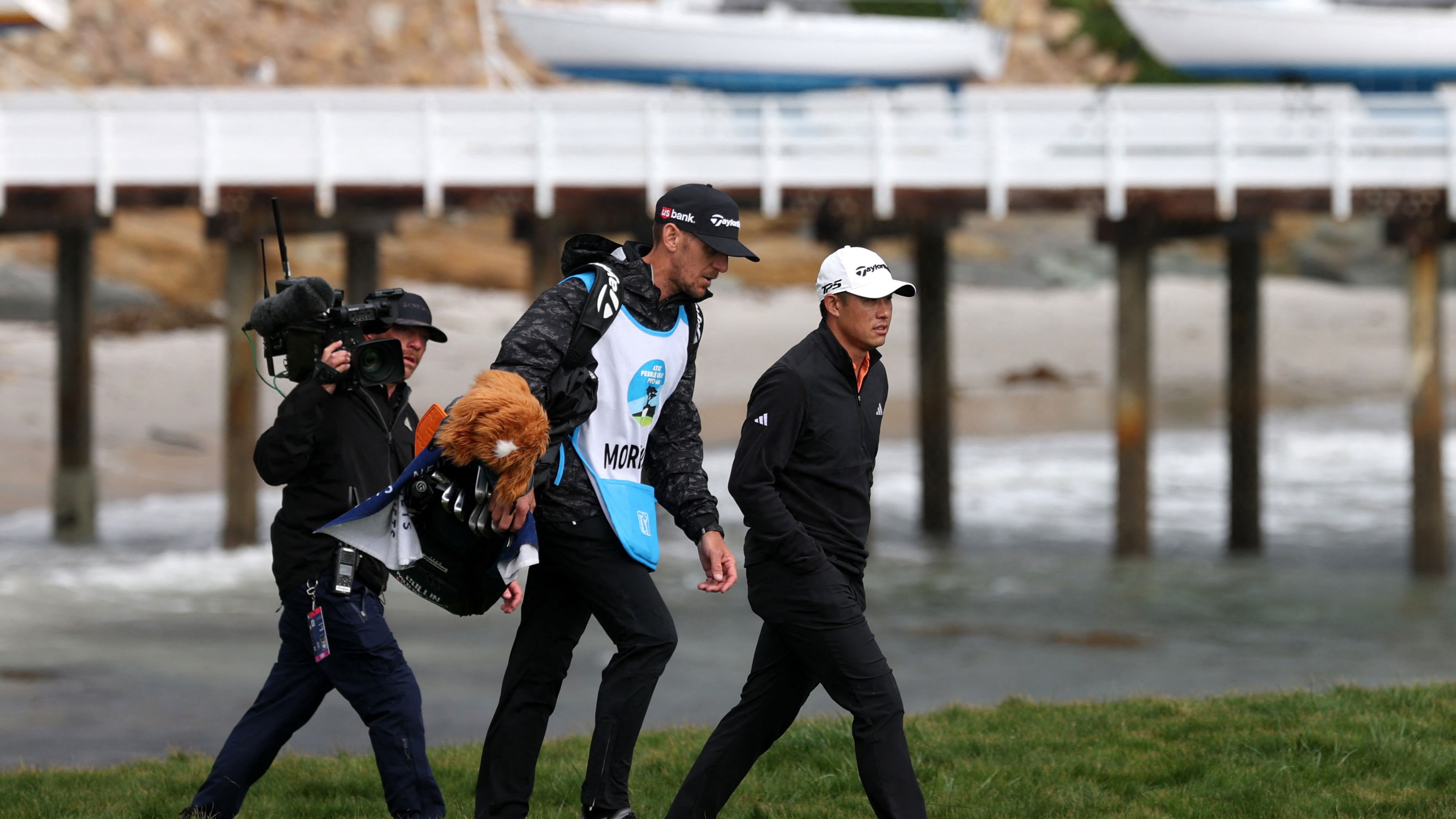 Collin Morikawa and his caddie