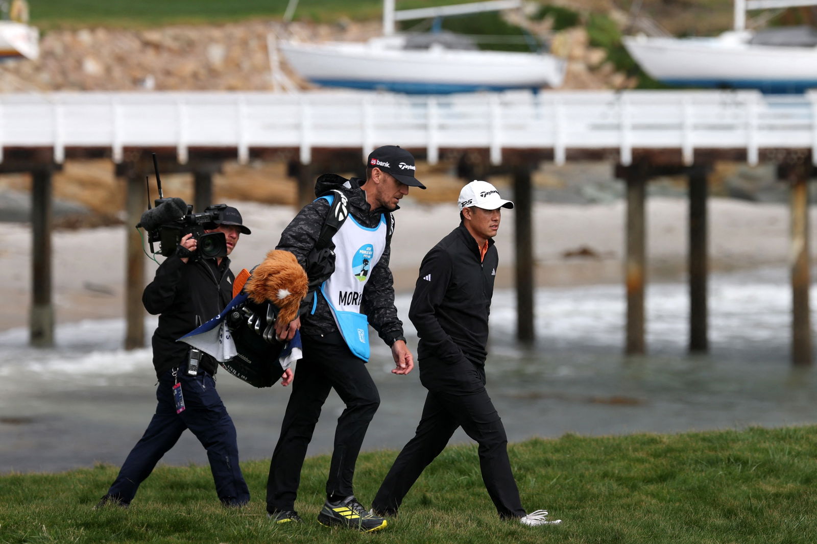 Collin Morikawa and his caddie