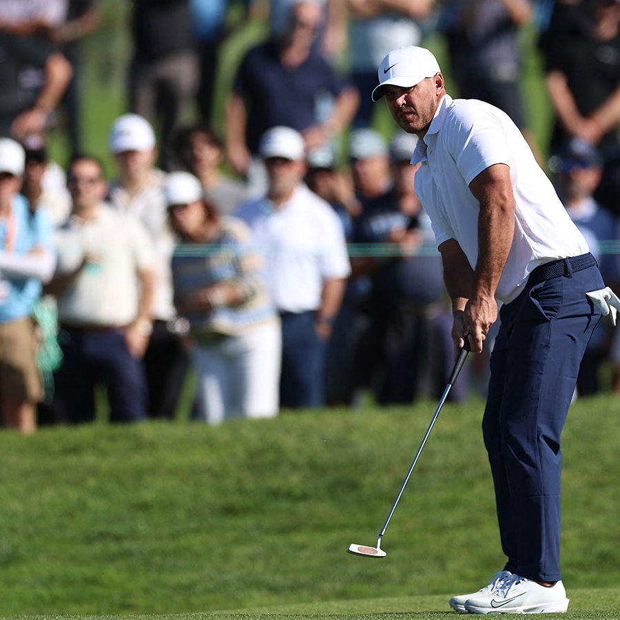 Brooks Koepka putts on the tenth green during the second round of the Farmers Insurance Open golf tournament. Image: Reuters