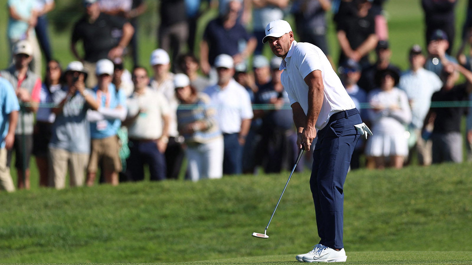 Brooks Koepka putts on the tenth green during the second round of the Farmers Insurance Open golf tournament. Image: Reuters