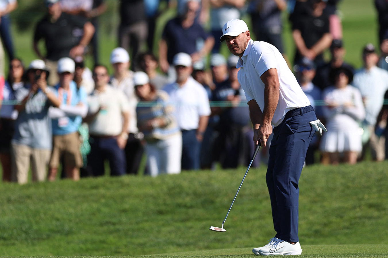 Brooks Koepka putts on the tenth green during the second round of the Farmers Insurance Open golf tournament. Image: Reuters