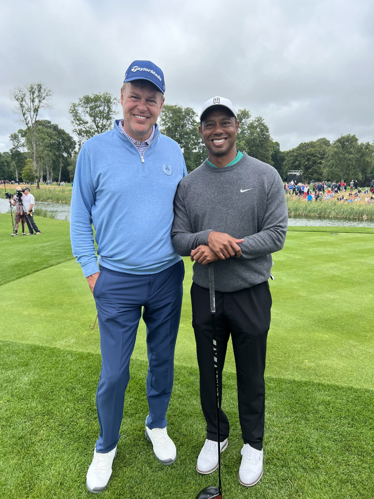 Peter Jones with golf legend Tiger Woods