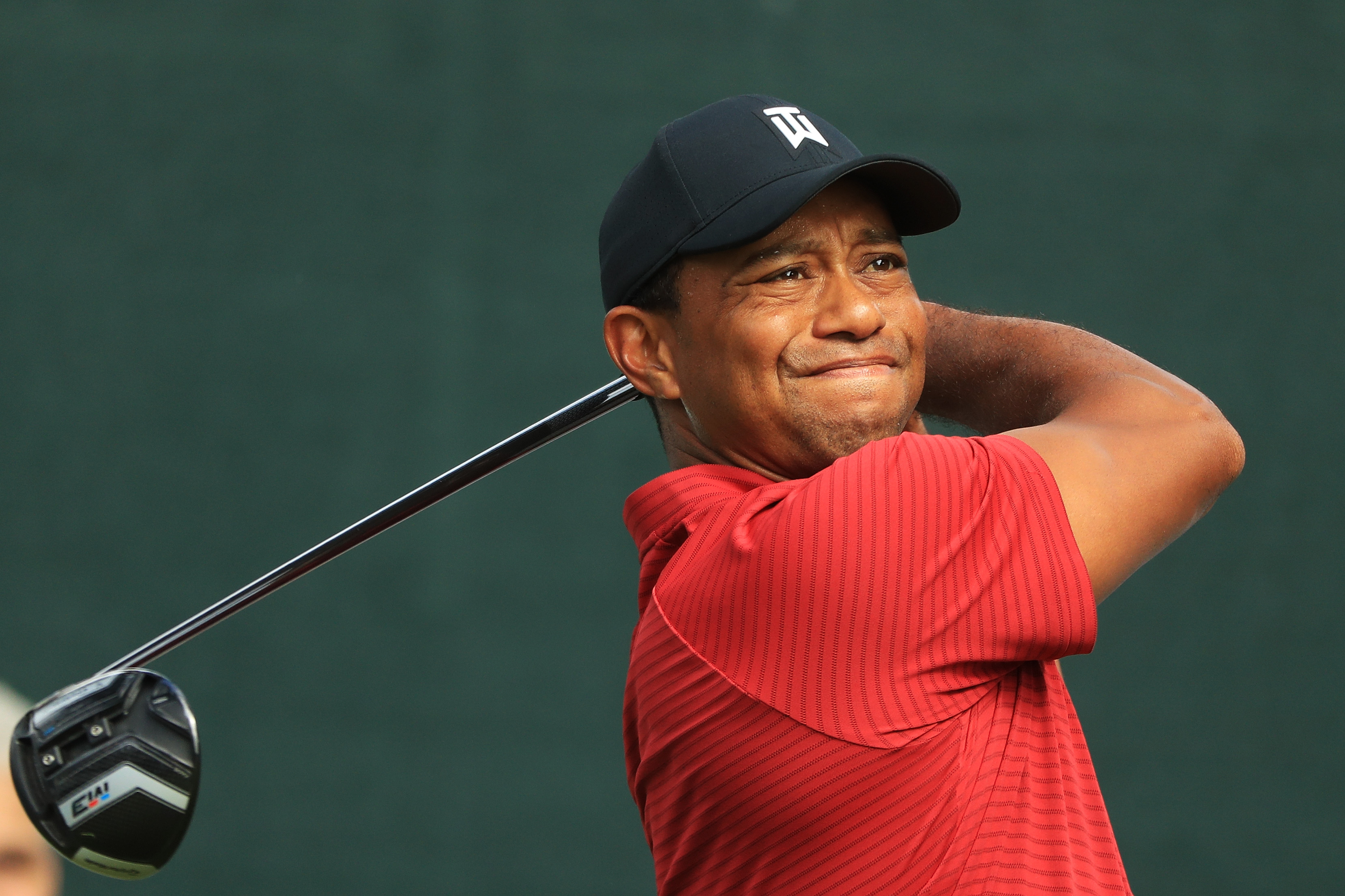 Tiger Woods says he's doing just fine without a golf swing coach