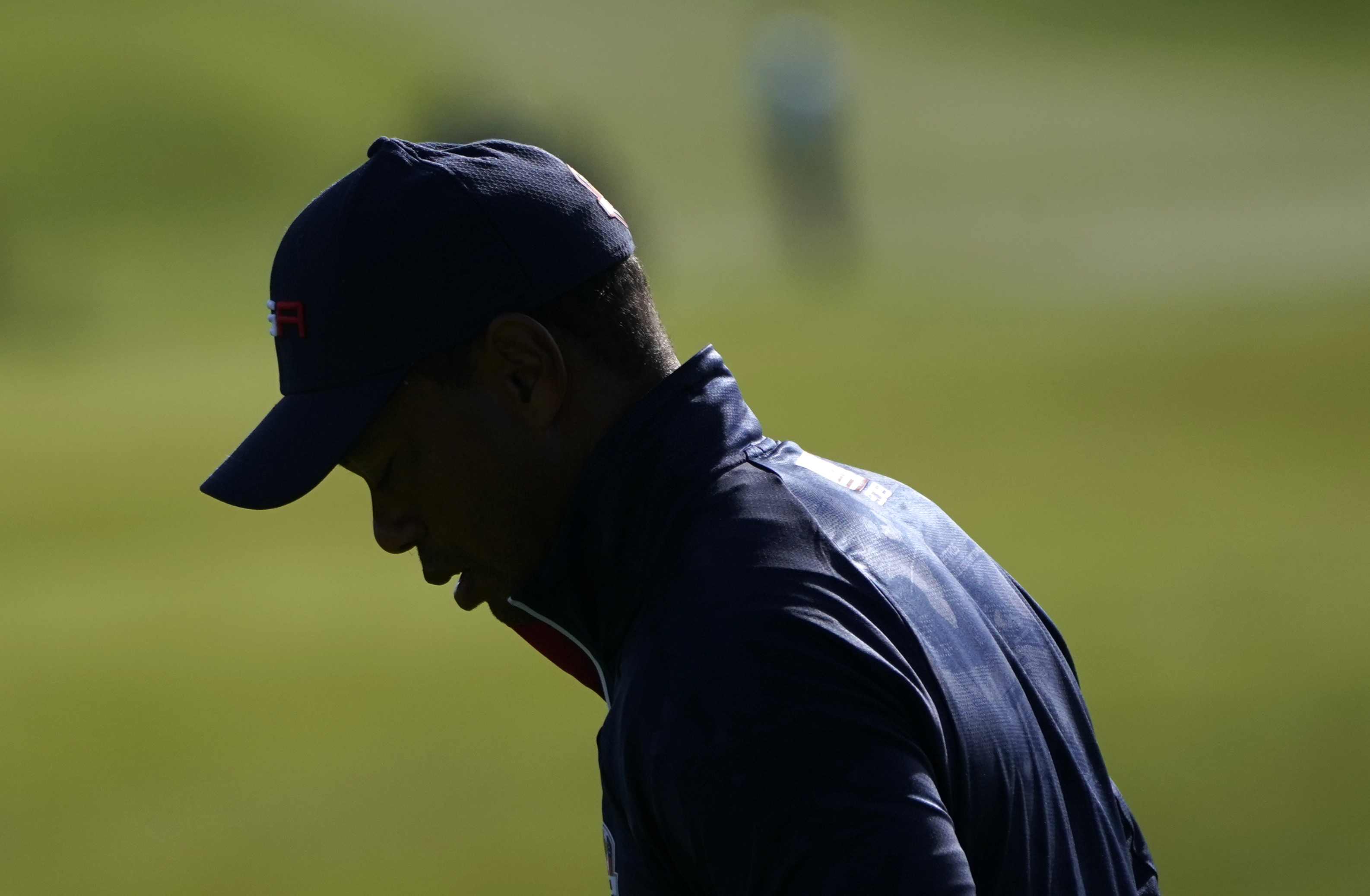 Tiger Woods looks in a lot of pain as he loses Ryder Cup match again