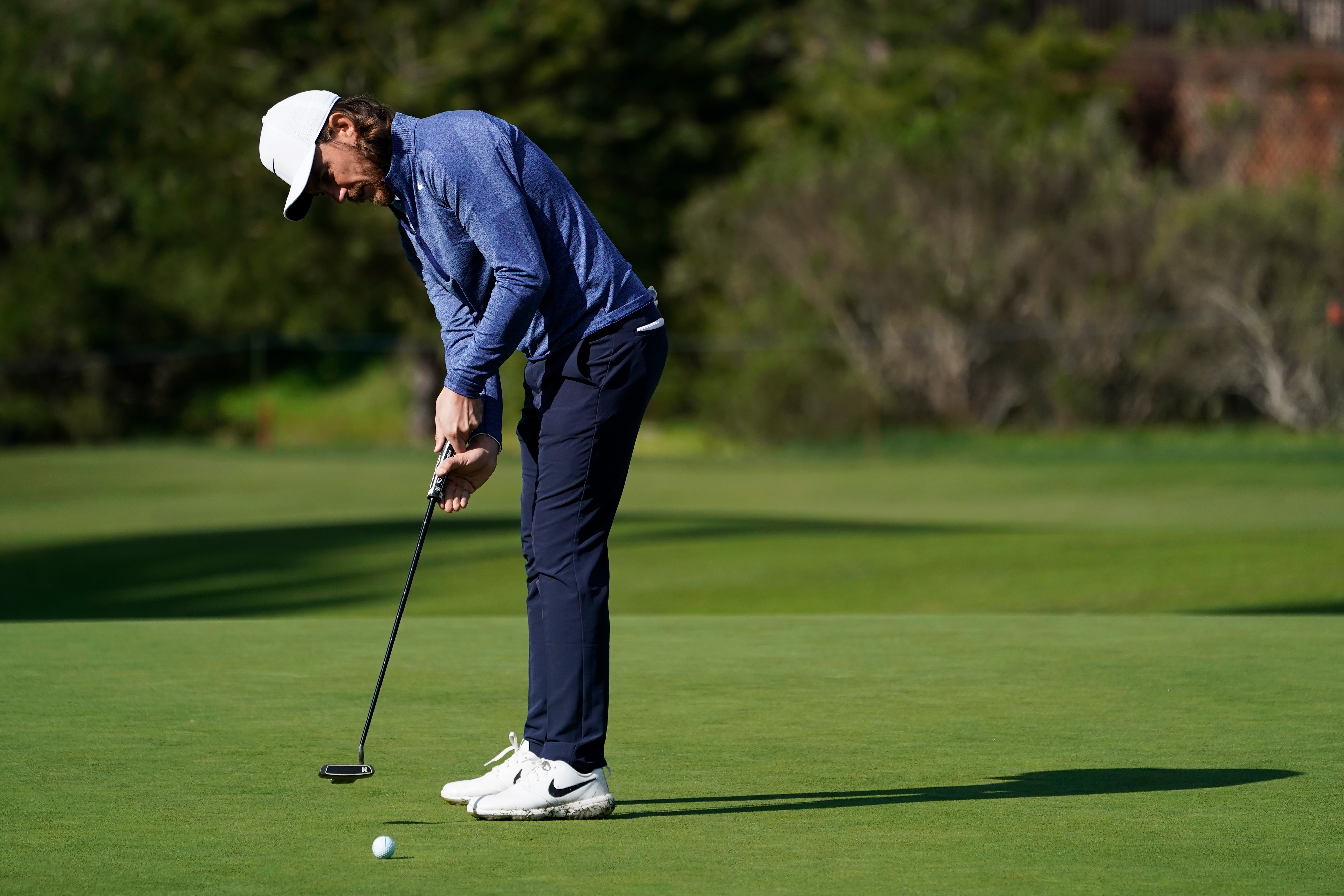 Tommy Fleetwood using putter at Genesis Open