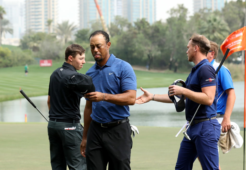 Tiger Woods withdraws with back injury in Dubai