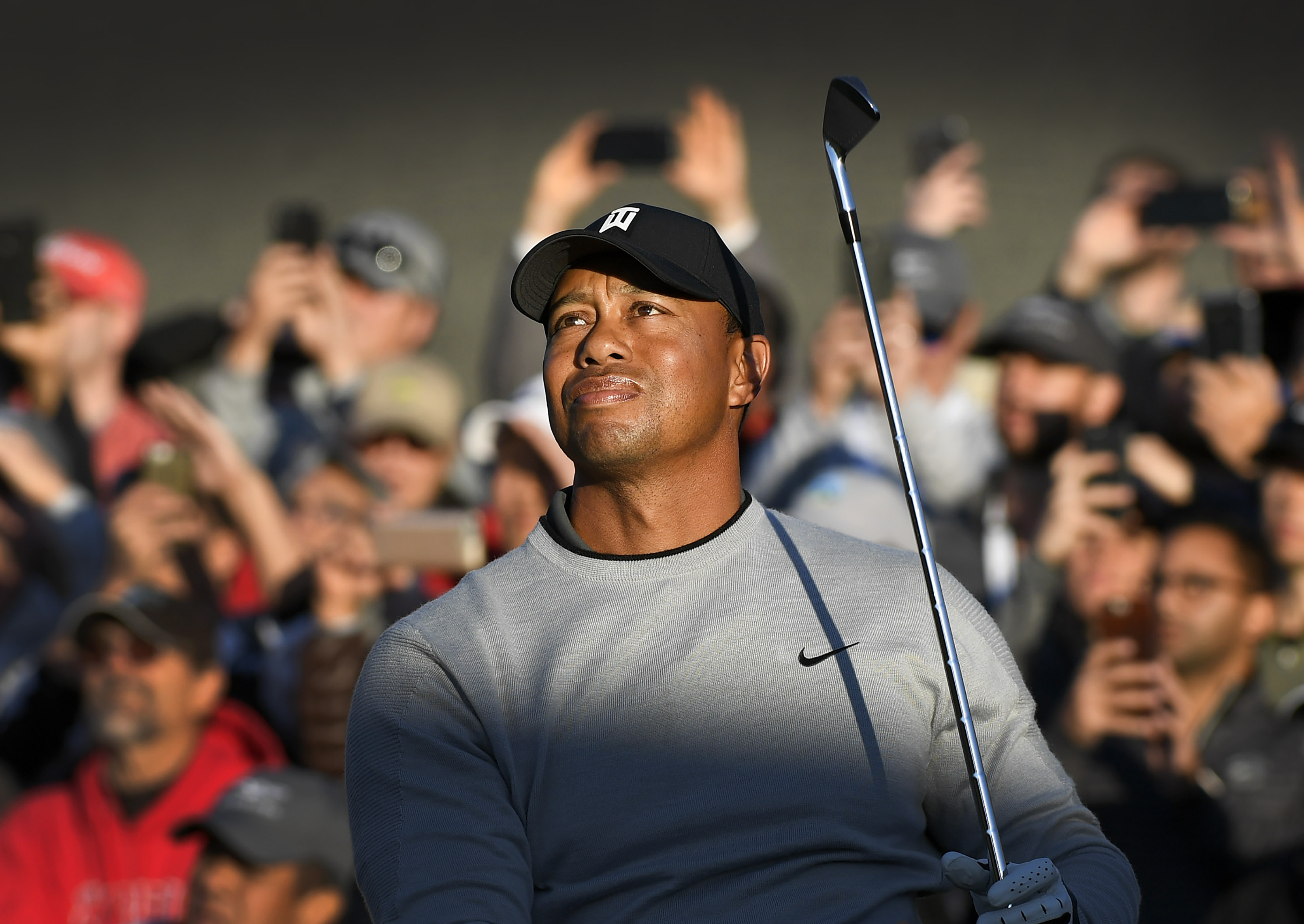 Tiger Woods urges fans to just kind of slow down 