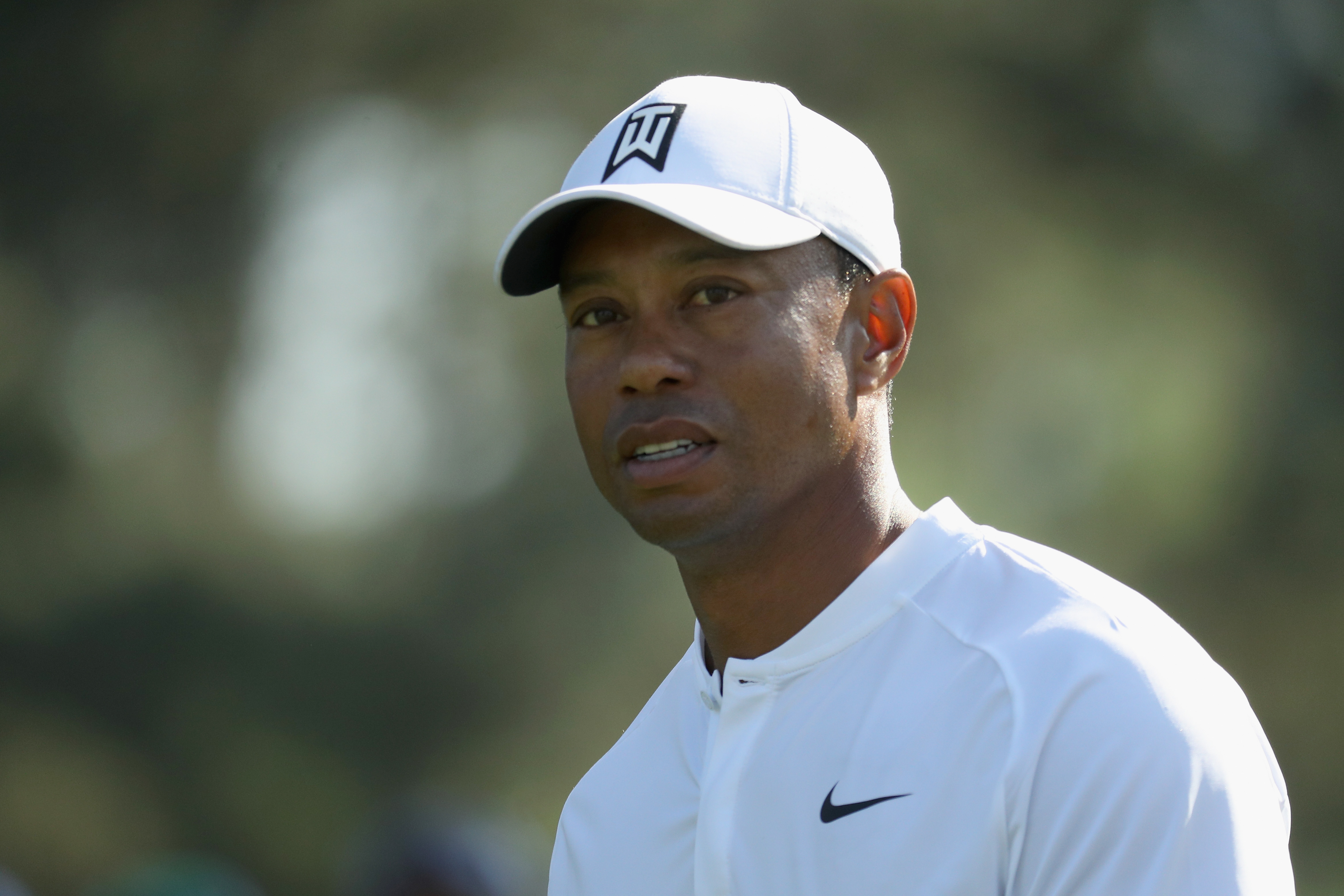 Tiger Woods urges fans to just kind of slow down 